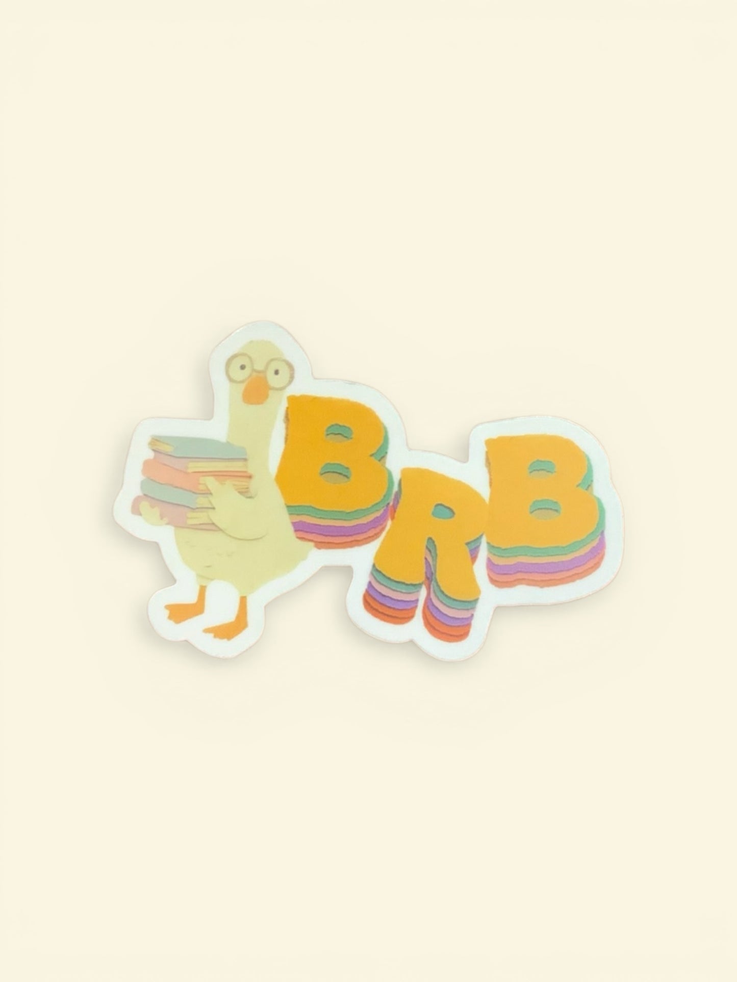 Sticker with a duck and 'BRB' text on a beige background