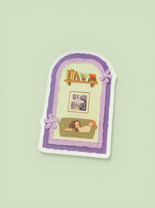 Decorative sticker with a design of a person on a couch with books, framed by a purple border on a light green background.