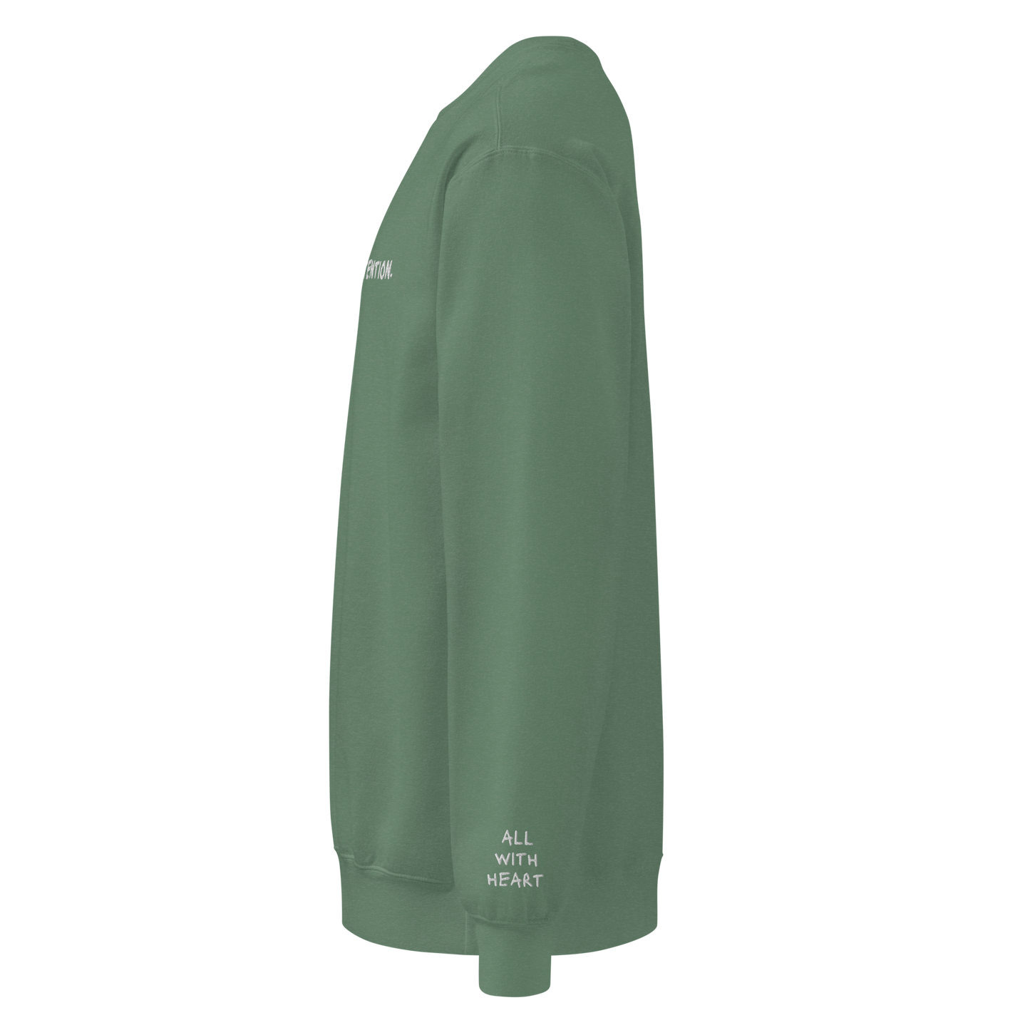 The left side of a green eco-conscious crewneck that has “All With Heart” written on the sleeve.