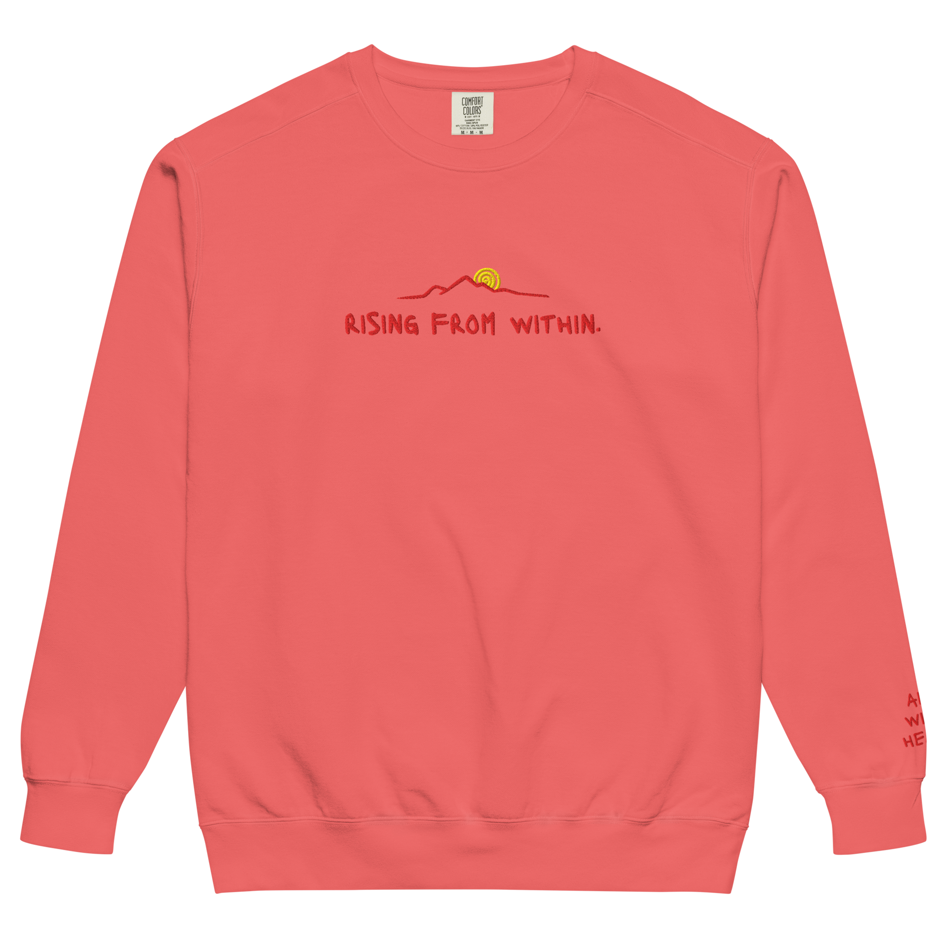 A bright red Crewneck that says “Rising From Within” with a mountain ridge design.